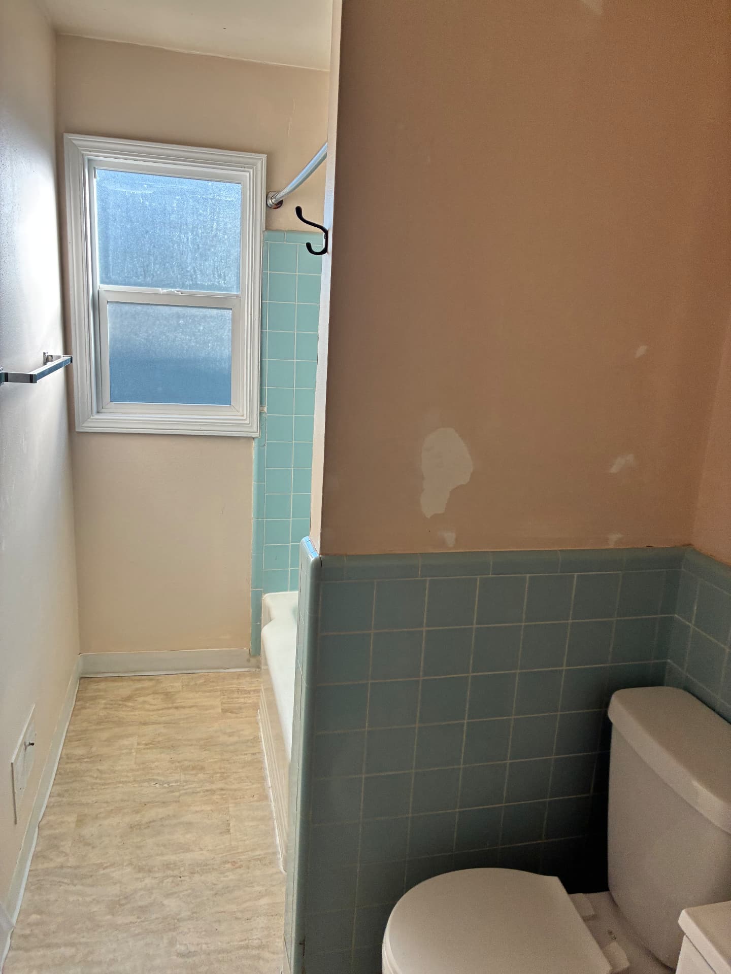 Bathroom turnover: drywall patch & paint — before
